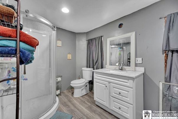 Bathroom, Glass Shower, Interior, Recessed Lighting, Wood Texture Flooring