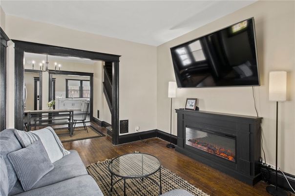 Dining room, Fireplace, Interior, Pendant Lights, Wood Texture Flooring