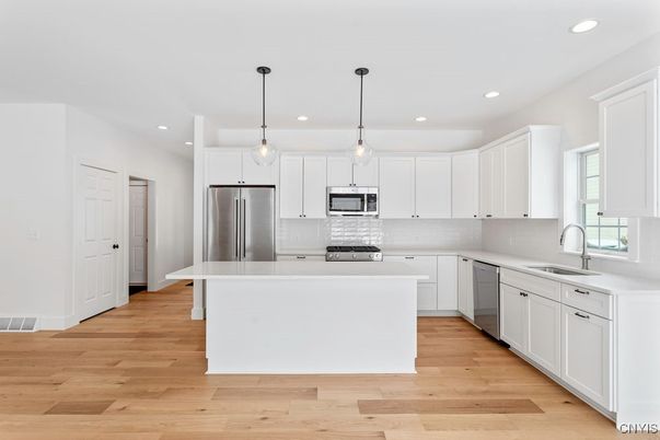 Interior, Kitchen, Pendant Lights, Recessed Lighting, Stainless Steel Appliances, Wood Texture Flooring