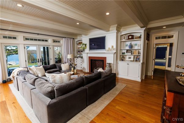 Fireplace, Interior, Living room, Recessed Lighting, Water, Wood Texture Flooring