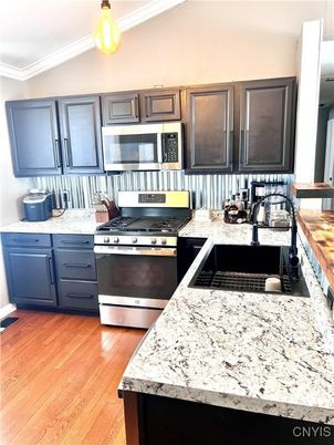 Interior, Kitchen, Pendant Lights, Stainless Steel Appliances, Wood Texture Flooring