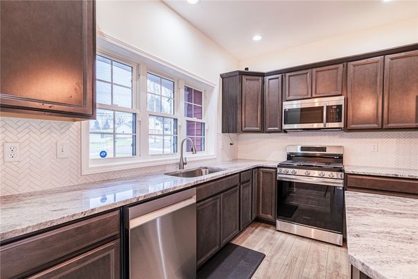 Interior, Kitchen, Recessed Lighting, Stainless Steel Appliances, Wood Texture Flooring