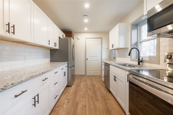 Interior, Kitchen, Recessed Lighting, Stainless Steel Appliances, Wood Texture Flooring