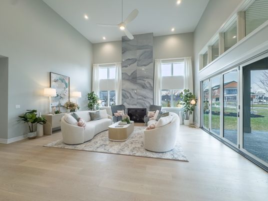 Fireplace, Interior, Living room, Marble Walls, Recessed Lighting, Wood Texture Flooring
