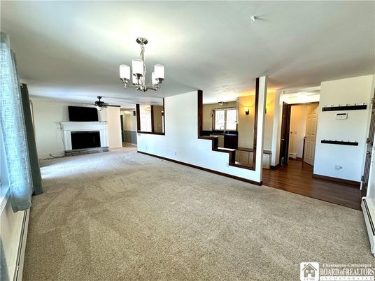 Chandelier, Empty room, Fireplace, Interior, Wood Texture Flooring