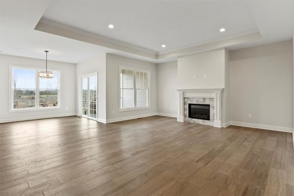 Chandelier, Empty room, Fireplace, Interior, Pendant Lights, Recessed Lighting, Wood Texture Flooring