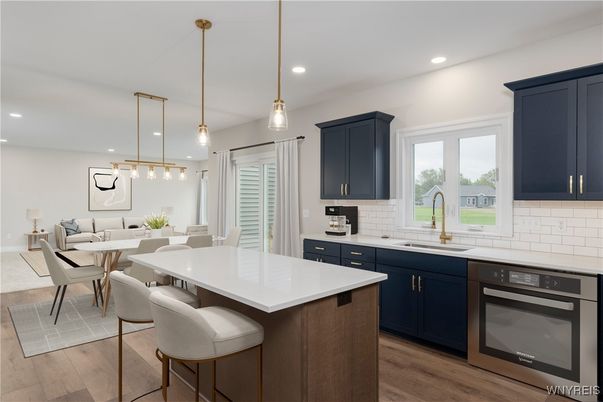 Dining room, Interior, Kitchen, Living room, Pendant Lights, Recessed Lighting, Stainless Steel Appliances, Wood Texture Flooring