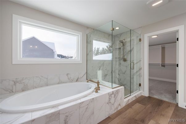 Bathroom, Glass Shower, Interior, Marble Walls, Recessed Lighting, Wood Texture Flooring
