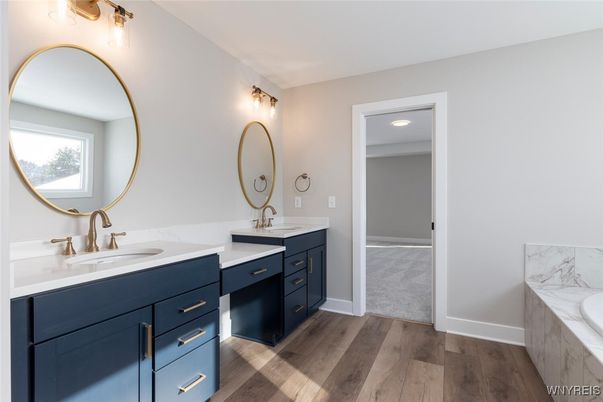 Bathroom, Dual Sink Vanities, Interior, Recessed Lighting, Wood Texture Flooring