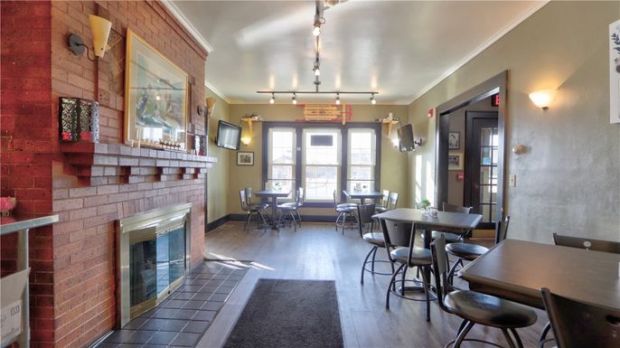 Dining room, Fireplace, Interior, Pendant Lights, Stone Walls, Wood Texture Flooring