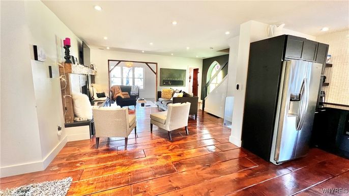 Fireplace, Interior, Kitchen, Living room, Recessed Lighting, Stainless Steel Appliances, Wood Texture Flooring