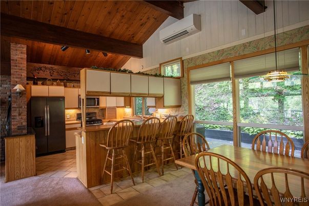 Dining room, Interior, Kitchen, Pendant Lights, Stainless Steel Appliances, Stone Walls, Wooden Beams, Wooden Ceilings