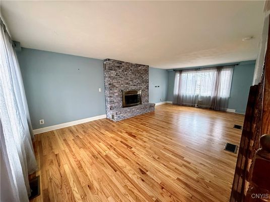 Empty room, Fireplace, Interior, Stone Walls, Wood Texture Flooring