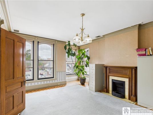 Chandelier, Empty room, Fireplace, Interior