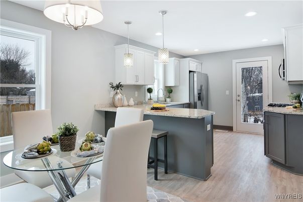 Dining room, Interior, Kitchen, Pendant Lights, Recessed Lighting, Stainless Steel Appliances, Wood Texture Flooring