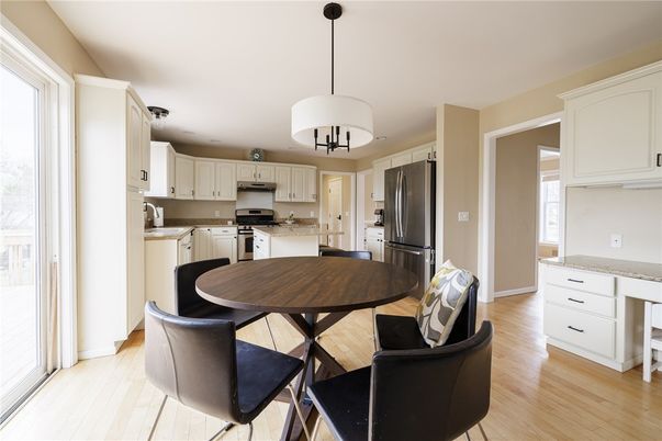 Dining room, Interior, Kitchen, Pendant Lights, Stainless Steel Appliances, Wood Texture Flooring