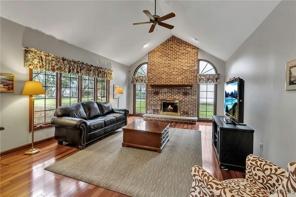 Fireplace, Interior, Living room, Recessed Lighting, Stone Walls, Wood Texture Flooring