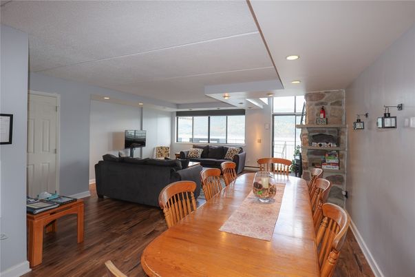 Dining room, Fireplace, Interior, Living room, Recessed Lighting, Wood Texture Flooring