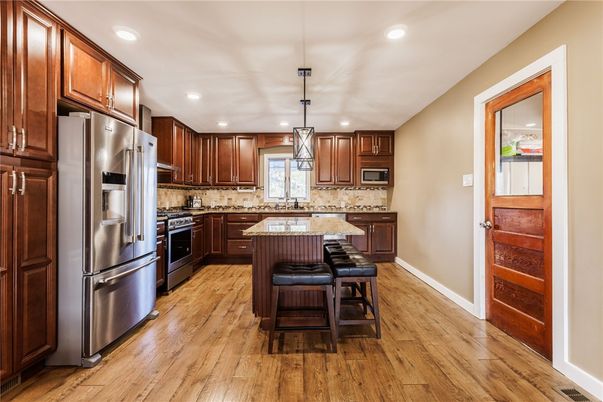 Interior, Kitchen, Pendant Lights, Recessed Lighting, Stainless Steel Appliances, Wood Texture Flooring
