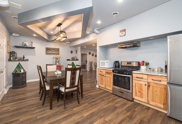 Dining room, Interior, Kitchen, Pendant Lights, Recessed Lighting, Stainless Steel Appliances, Wood Texture Flooring