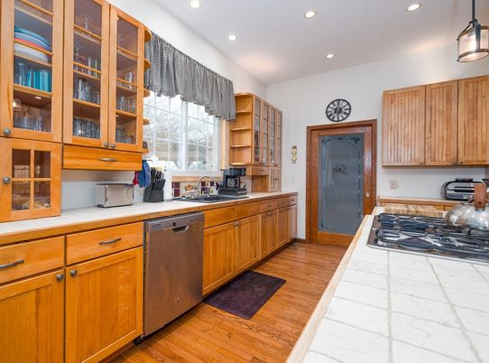 Interior, Kitchen, Recessed Lighting, Tile Countertops, Wood Texture Flooring