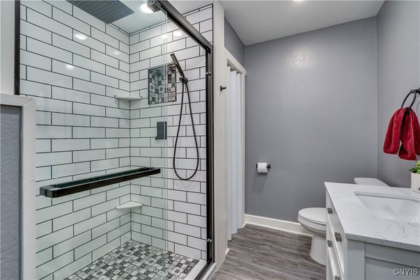 Bathroom, Glass Shower, Interior, Recessed Lighting, Wood Texture Flooring
