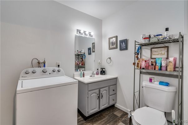 Bathroom, Interior, Utility Closets, Washer, Wood Texture Flooring