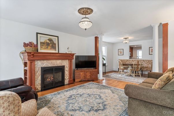 Chandelier, Dining room, Fireplace, Interior, Living room, Wood Texture Flooring