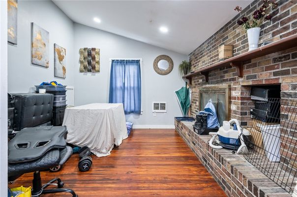 Fireplace, Interior, Recessed Lighting, Stone Walls, Wood Texture Flooring