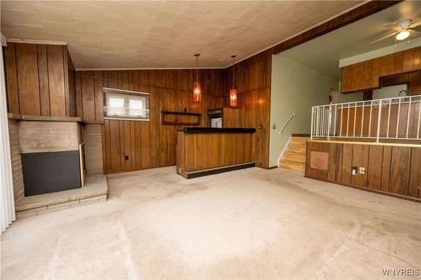 Empty room, Fireplace, Interior, Kitchen, Pendant Lights, Wooden Walls