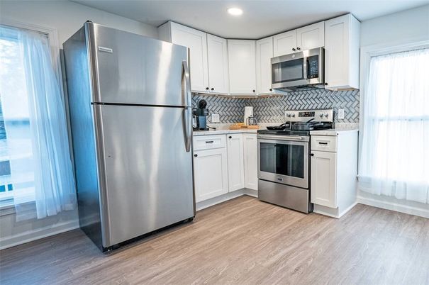 Interior, Kitchen, Recessed Lighting, Stainless Steel Appliances, Wood Texture Flooring