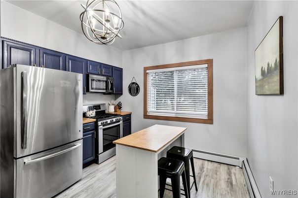 Chandelier, Interior, Kitchen, Pendant Lights, Stainless Steel Appliances, Wood Texture Flooring
