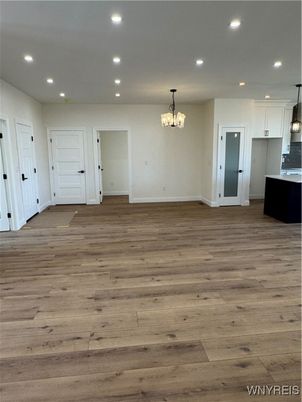 Chandelier, Empty room, Interior, Kitchen, Pendant Lights, Recessed Lighting, Wood Texture Flooring