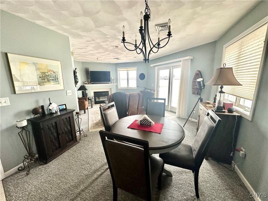 Chandelier, Dining room, Fireplace, Interior, Living room