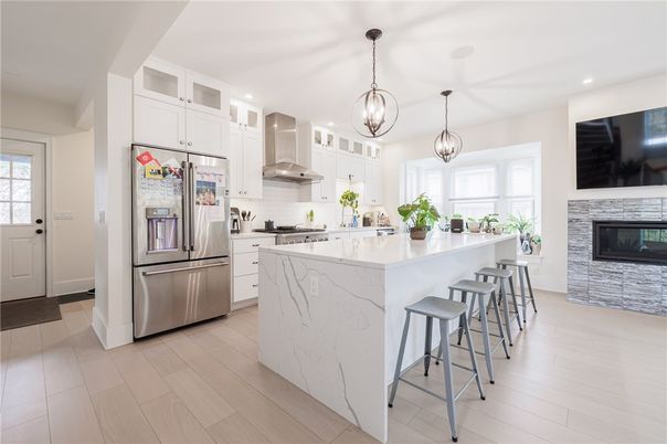 Fireplace, Interior, Kitchen, Pendant Lights, Recessed Lighting, Stainless Steel Appliances, Wood Texture Flooring