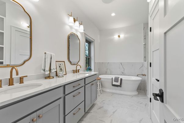 Bathroom, Dual Sink Vanities, Free Standing Baths, Interior, Marble, Marble Walls, Recessed Lighting