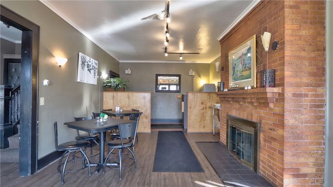 Dining room, Fireplace, Interior, Pendant Lights, Stone Walls, Wood Texture Flooring