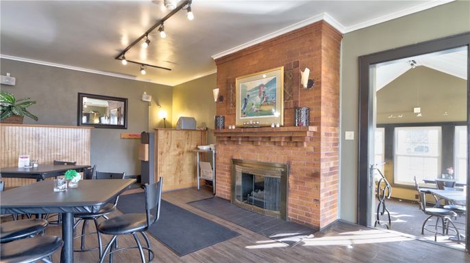 Dining room, Fireplace, Interior, Stone Walls, Wood Texture Flooring