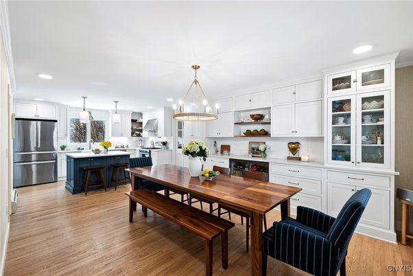 Dining room, Interior, Kitchen, Pendant Lights, Recessed Lighting, Stainless Steel Appliances, Wood Texture Flooring