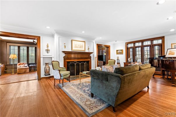 Fireplace, Interior, Living room, Piano, Recessed Lighting, Wood Texture Flooring