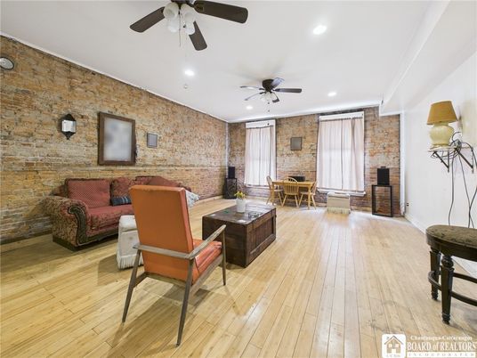 Dining room, Interior, Living room, Recessed Lighting, Stone Walls, Wood Texture Flooring