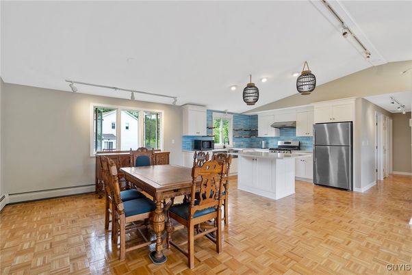 Dining room, Interior, Kitchen, Recessed Lighting, Stainless Steel Appliances, Wood Texture Flooring