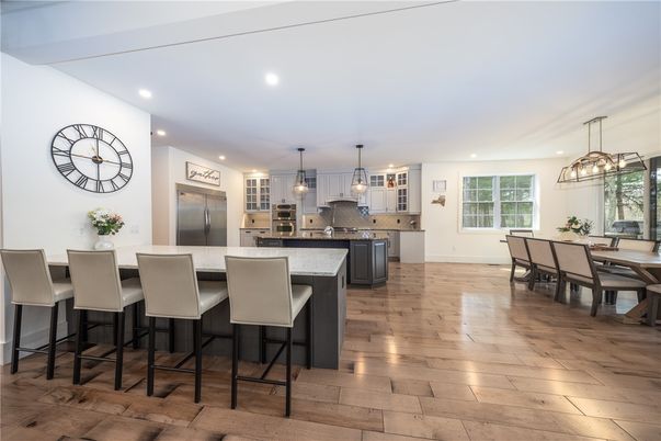 Dining room, Interior, Kitchen, Pendant Lights, Recessed Lighting, Stainless Steel Appliances, Wood Texture Flooring