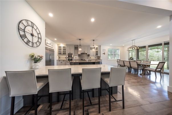 Chandelier, Dining room, Interior, Kitchen, Pendant Lights, Recessed Lighting, Stainless Steel Appliances, Wood Texture Flooring