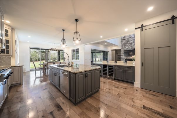 Dining room, Interior, Kitchen, Pendant Lights, Recessed Lighting, Stainless Steel Appliances, Wood Texture Flooring