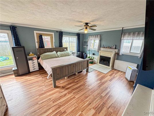 Bedroom, Fireplace, Interior, Wood Texture Flooring