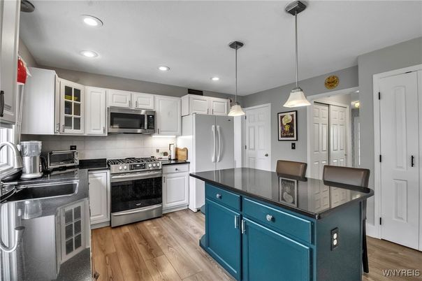 Interior, Kitchen, Pendant Lights, Recessed Lighting, Stainless Steel Appliances, Wood Texture Flooring