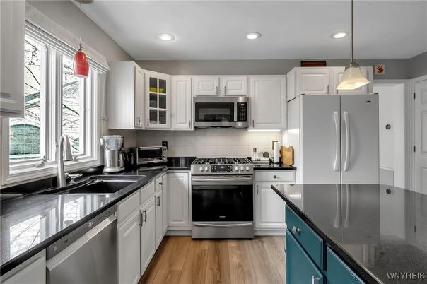 Interior, Kitchen, Pendant Lights, Recessed Lighting, Stainless Steel Appliances, Wood Texture Flooring