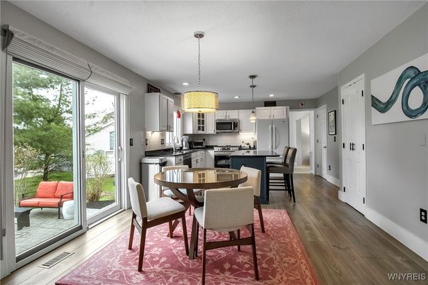 Dining room, Interior, Kitchen, Pendant Lights, Recessed Lighting, Stainless Steel Appliances, Wood Texture Flooring