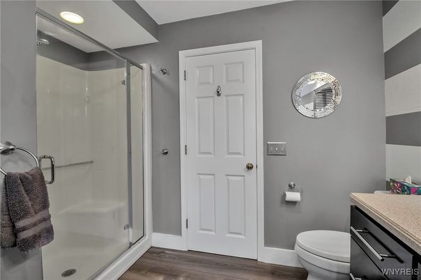 Bathroom, Glass Shower, Interior, Recessed Lighting, Wood Texture Flooring